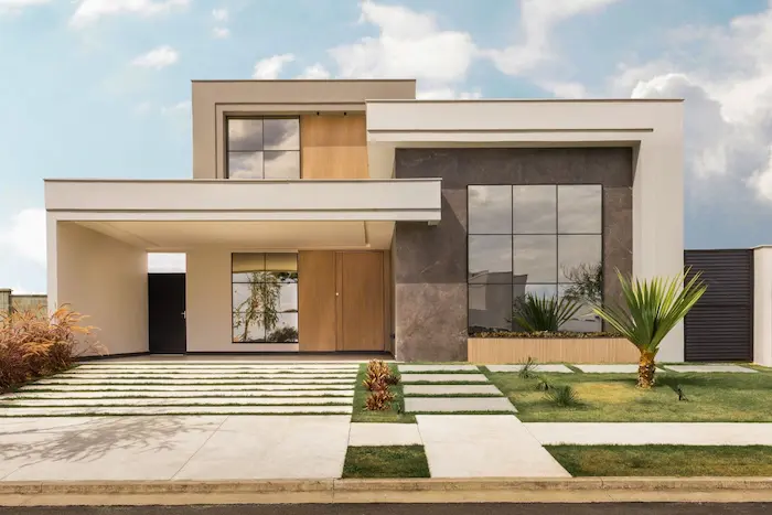 Maison moderne à deux étages avec façade élégante, image évoquant la livraison VEFA et la remise d’un bien immobilier neuf aux acquéreurs.